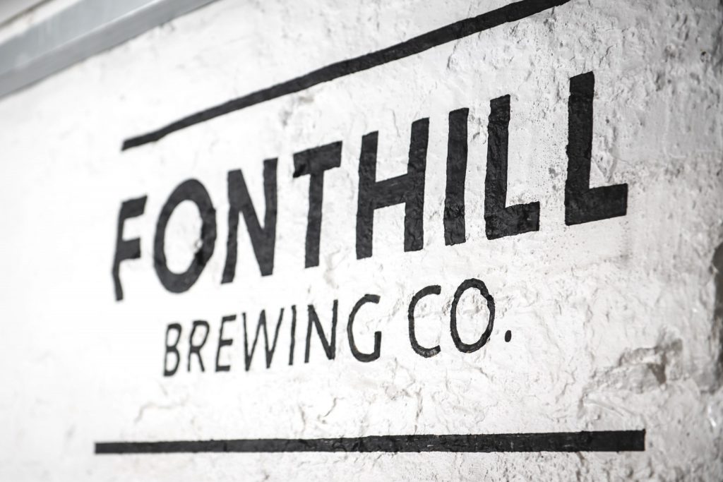 Fonhill Brewing Co.'s logo stencilled on to the interior of the brewery 