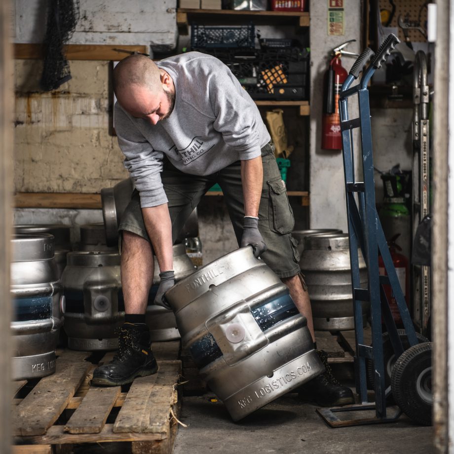 Headbrewer, Paul shifting around some heavy beer casks