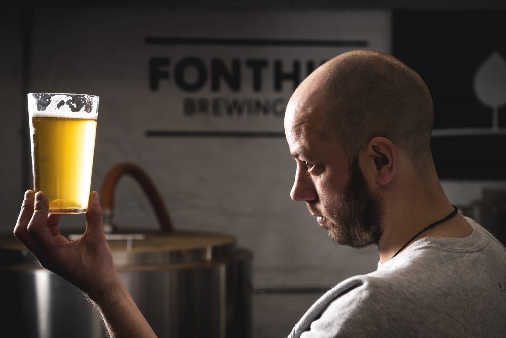 Fonthill Brewing Co's head brewer checks for clarity