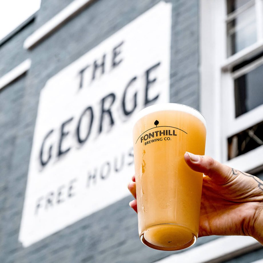A pint of local craft beer served in a beer glass, at The George pub in Tunbridge Wells