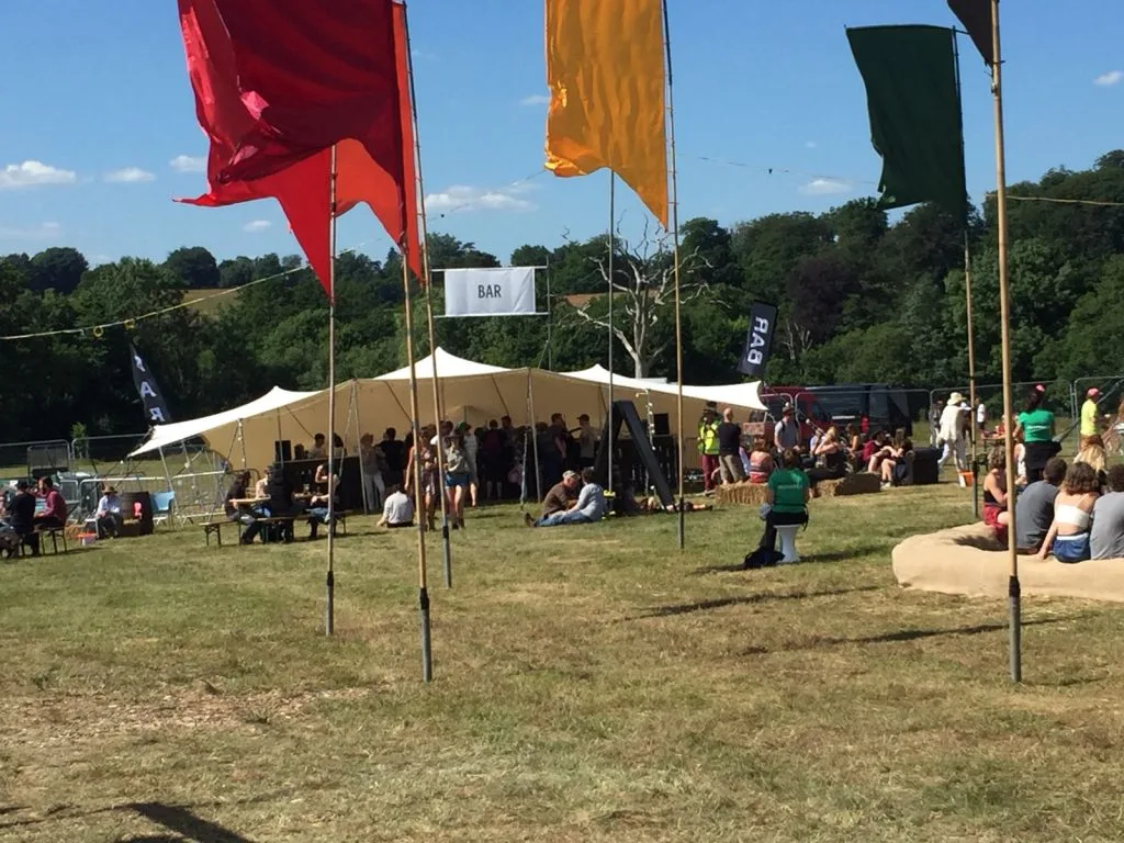 Beer taps and bottles at the Local & Live festival bar tent