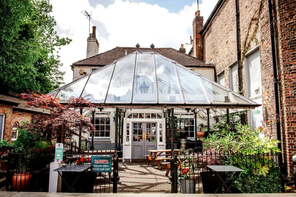 The covered, sunny patio of the Sussex Arms pub in Tunbridge Wells